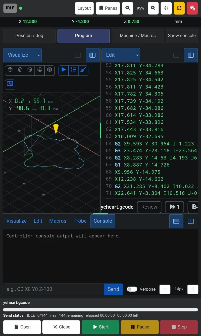 A tablet held upright with the toolpath and the G-code editor side by side above a console.