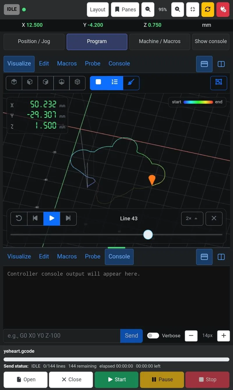A tablet held upright with the toolpath in simulation above and the console below.